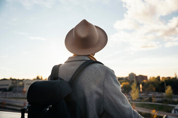 thoughtful man contemplating the city