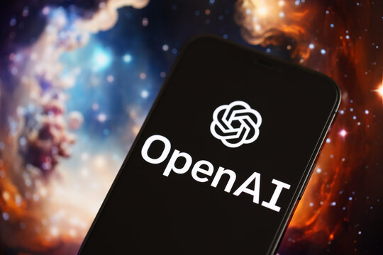 KYIV, UKRAINE - MARCH 17, 2024 OpenAI logo on iPhone display screen with background of artificial intelligence futuristic ai generated image close up