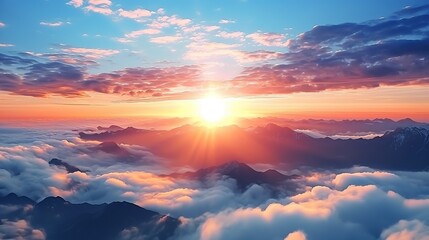 Fototapeta premium Beautiful golden sunset above cloud with sun shinning on horizon and mountain.
