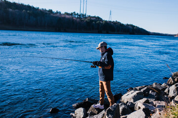 Man fishing in a canal