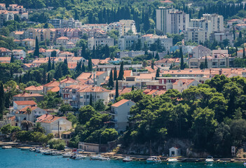 Houses over waters of Bay of Gruz in Dubrovnik city, Croatia