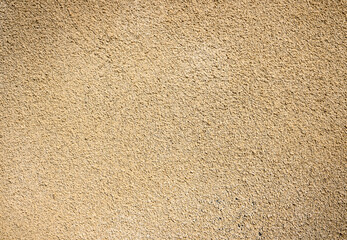 Beige plastered wall texture background