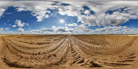 360 hdri panorama view on no traffic gravel dirt muddy road among fields in spring day with...