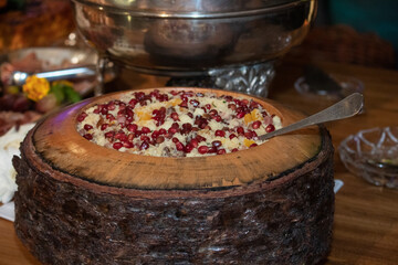 round rustic tray, rice with pomegranate, Christmas recipe, Christmas buffet, thanksgiving day, thanksgiving, thanksgiving meal, haute cuisine	
