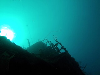 Silhouette of a shipwreck in the Caribbean Sea, off the coast of Utila, Honduras
