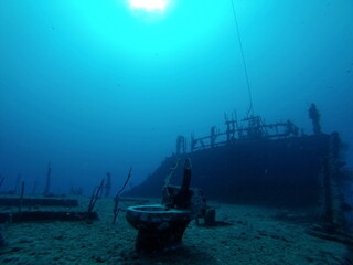 Toilet on the deck of a shipwreck in the Caribbean Sea, off the coast of Utila, Honduras