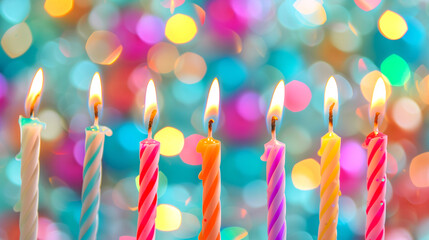 Birthday burning candles against blurred colorful background - 771091615