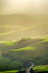 View of valley, rolling green hills, 