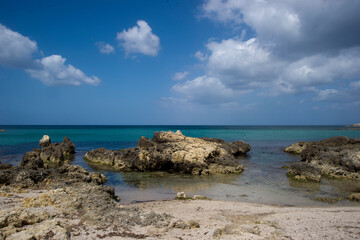 beach and rocks in Porto Torres beside the port Sardinia Italy
