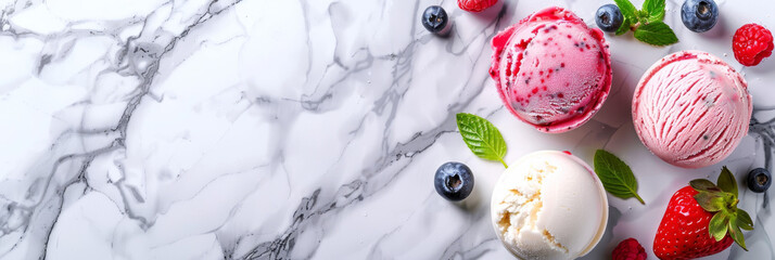 A luxurious assortment of ice cream scoops with fresh berries and mint on a sleek marble countertop Elegance and variety in dessert presentation