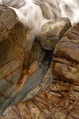 Detail of the sea crashing against the rocks on the beach of silence, Asturias, Spain. in silence...