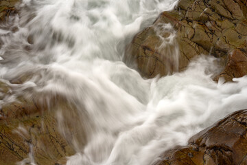 Detail of the sea crashing against the rocks on the beach of silence, Asturias, Spain. in silence...