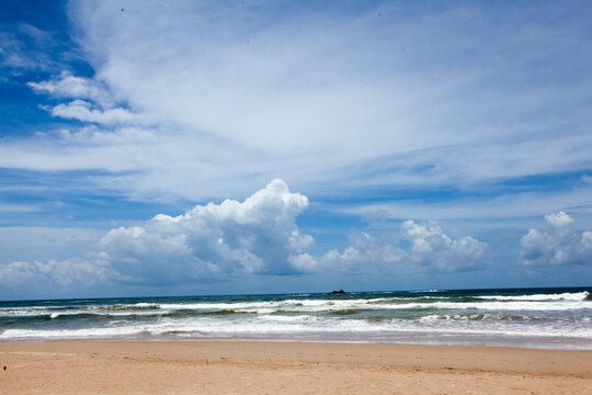 Rich blue cloudy sky on a beach