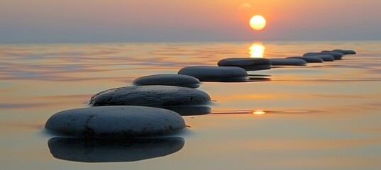 Fototapeta na wymiar Zen stones reflecting tranquil sunset s glow in serene waters create a peaceful ambiance