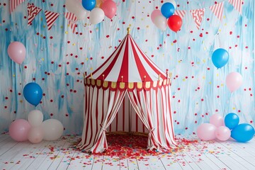 a circus tent is decorated with balloons and confetti