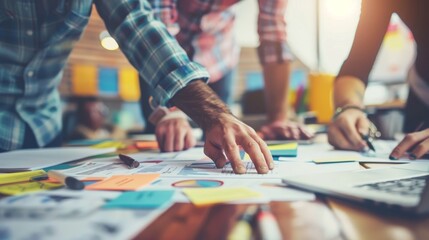 A close-up shot captures the intense collaboration and innovative spirit as a team of entrepreneurs strategize for their tech startup.
