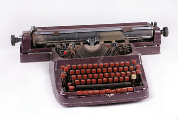 Old antique mechanical vintage typewriter on white with clipping puth