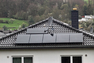 roof and chimney and solar panels