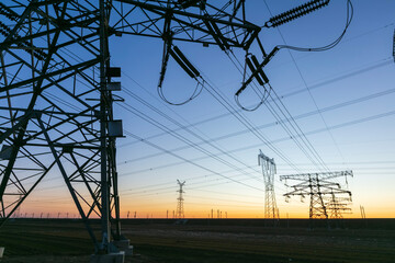 The pylons are in the evening, Substation in the evening, High voltage substation and beautiful sunset glow