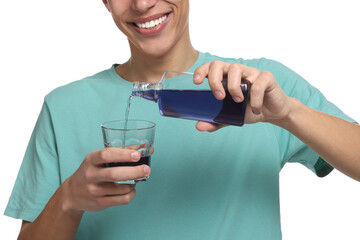 Young man with mouthwash on white background, closeup