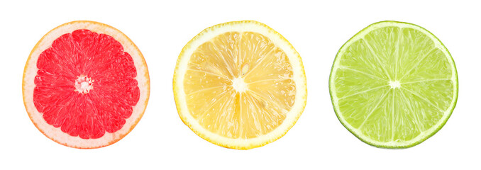 Citrus fruits. Cut fresh lemon, grapefruit and lime isolated on white, set