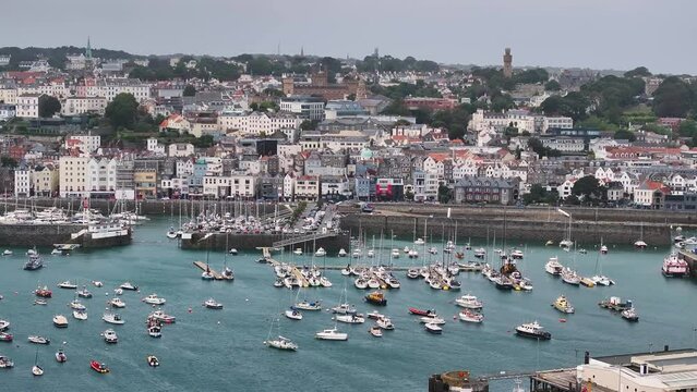 St. Peter Port, Guernsey, Channel Islands. Drone Aerial View of Harbor and Waterfront Buildings