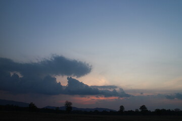 Colorful cloudy sky at sunset. Gradient color. Sky texture, abstract nature background