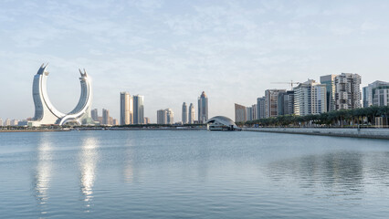 iconic lusail city with the crescent tower in the background