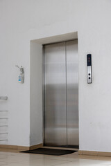 elevator with metal doors in a shopping center
