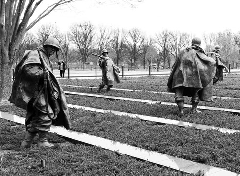 Washington DC &ndash; US &ndash; Mar 22, 2024 Korean War Veterans Memorial, a walled triangle with 19 stainless steel statues designed by Frank Gaylord, representing U.S. military personnel in action.