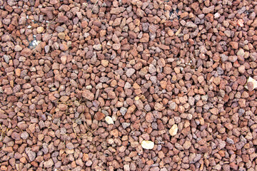Background of stone pebbles. Texture of stone pebbles. Abstract background and texture for design....