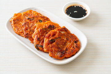 Korean Kimchi pancake or Kimchijeon - Fried Mixed Egg, Kimchi, and Flour