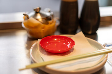 Close up of chopsticks on a plate
