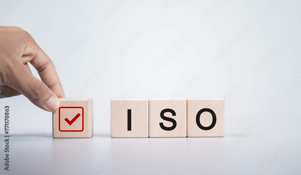 Poster iso standards quality control. wooden block with iso icon for quality assurance or guarantee product