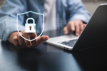 Cyber ​​security network. Data protection concept. Businessman touching shield with padlock in hand about global network connectivity, data protection and network security, insurance business