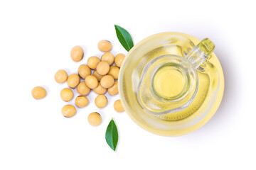 Soybean oil in glass bottle and soy beans isolated on white background. Top view, flat lay.