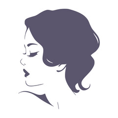 Young woman face side view in low key style. Elegant silhouette of a female head.