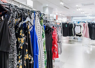 Various shop clothing in ladies' clothing store in summer	
