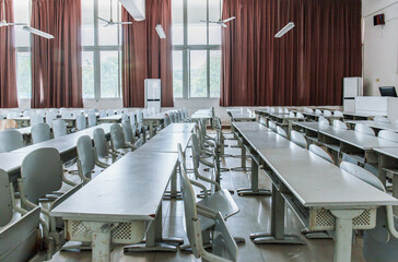 The empty and uninhabited classroom is particularly quiet