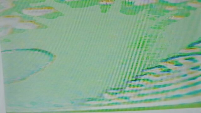 Weird TV static texture, close up of green pixels from VHS VCR overlay, glitch effect texture, analog video feedback