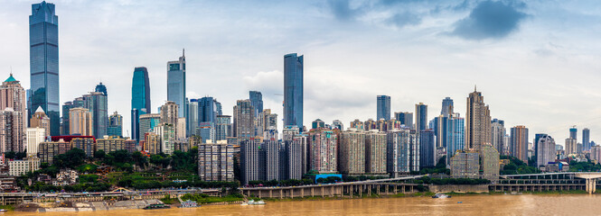 Naklejka premium The city center of Chongqing, China is densely populated with high-rise buildings, which are very developed