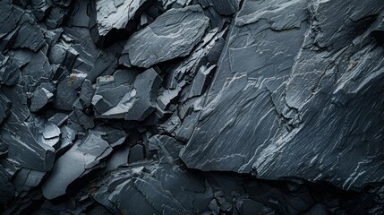 Graphite rocks on a blurred dark slate, conduction core
