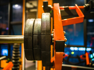 Obraz premium This is a photo of the gym equipment taken at a gym. This photo shows a black metal barbell piece.