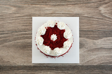 A top down view of a red velvet cake.	