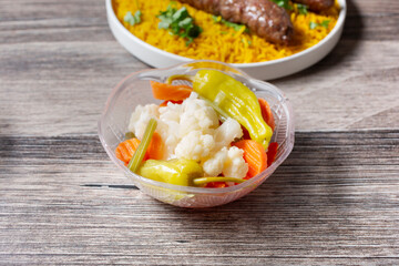 A view of a bowl of pickled vegetables.