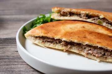 A closeup view of beef hawawshi.