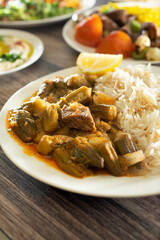 A view of a plate of khoresh bamieh.