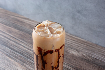 A closeup view of an iced mocha drink.