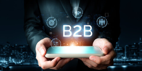 Business person navigates B2B landscape, harness technology to enhance business-to-business...