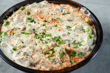 A view of a bowl of tahini salad.